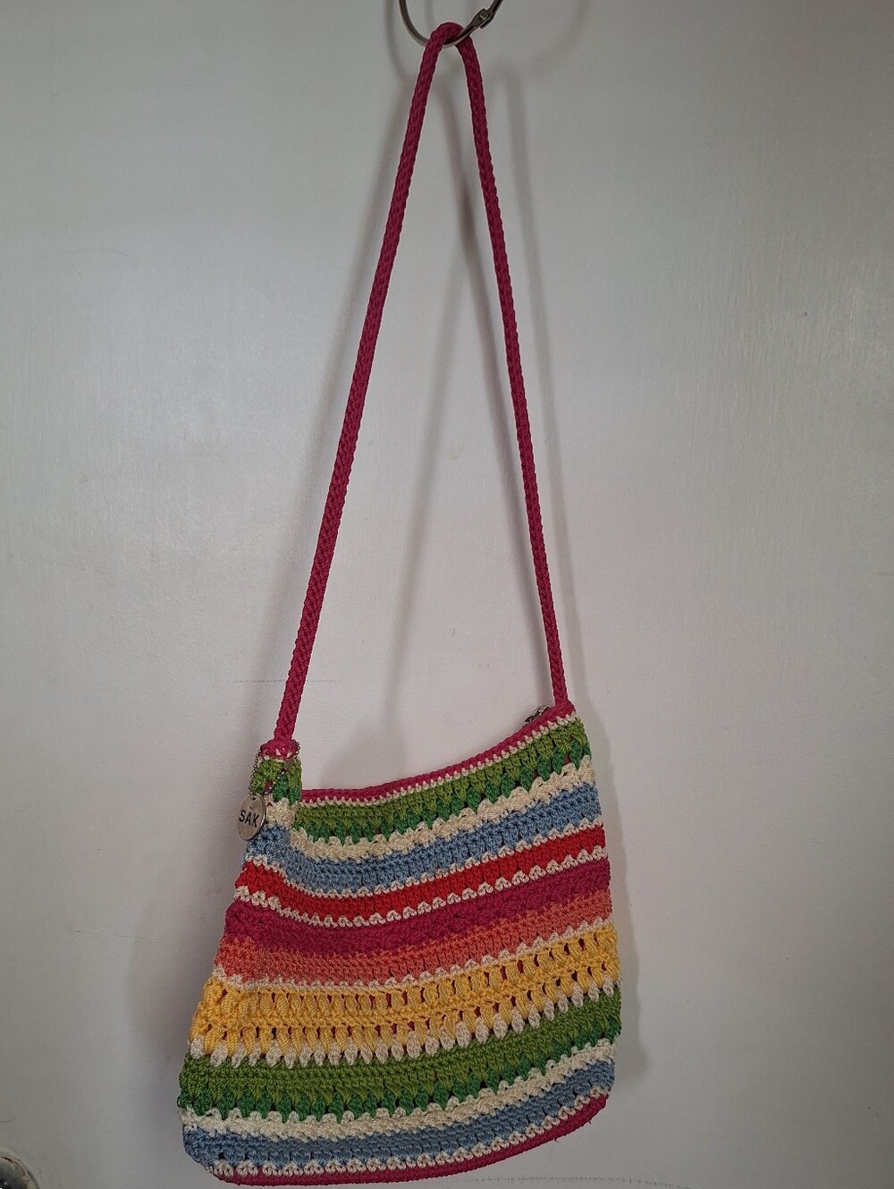 The Sak Multicolor Crochet Crossbody Bag with Pink Strap